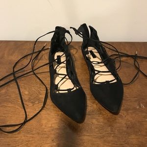 Black Lace up flats.
